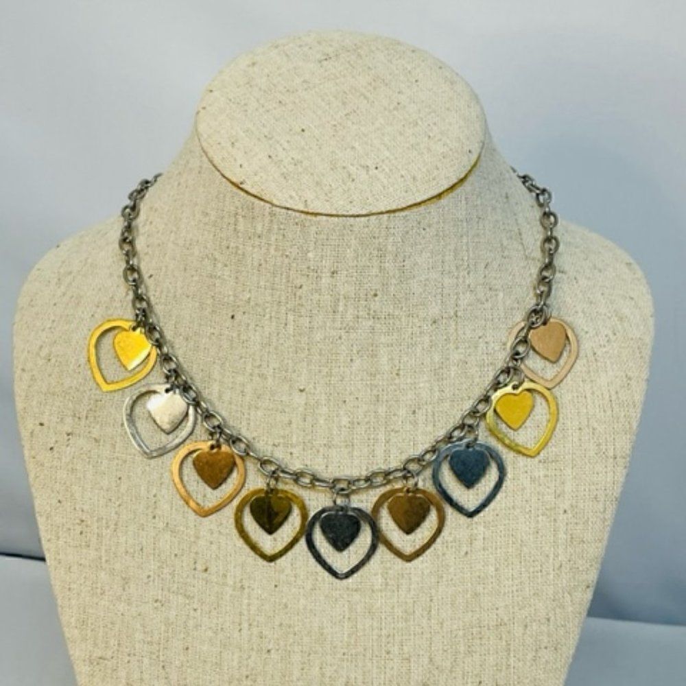 MILOR STAINLESS HEART NECKLACE as pictured.   In new condition without tags.   A